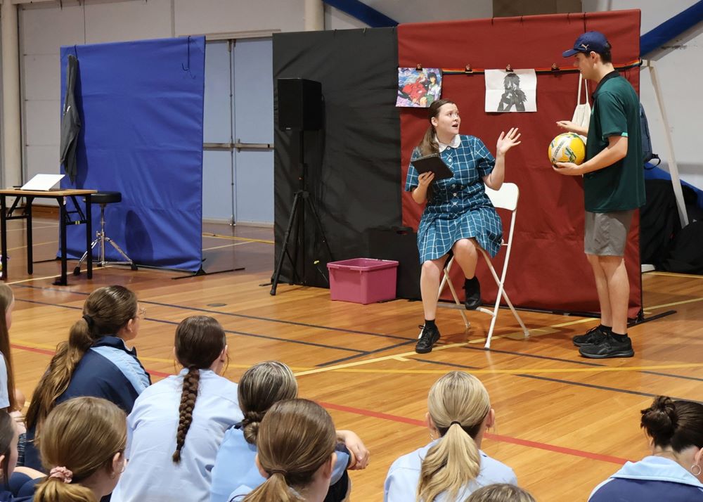 Two actors during a performance of the Brainstorm Productions mental health program for high schools called 'Wired'